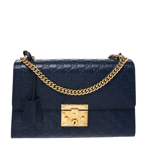 navy blue gucci handbag.